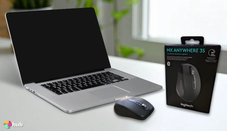 Logitech MX Anywhere 3S Mouse on a white office desk in a bright workspace for a review