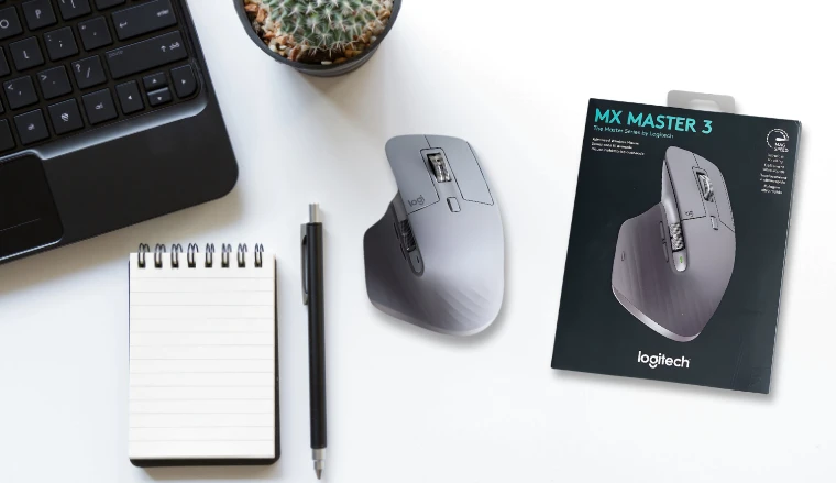Logitech MX Master 3S Mouse on a white office desk in a clean setup for a review