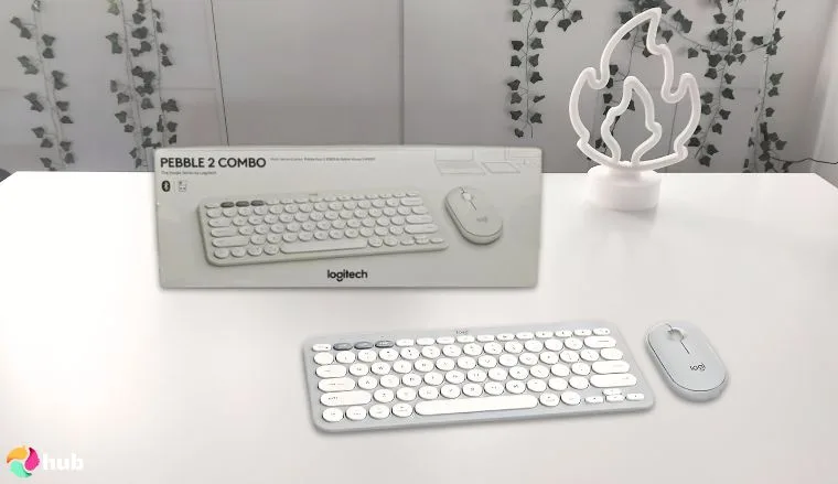 Logitech Pebble 2 Combo, Wireless Keyboard on a white office desk in a minimalist setup for a review