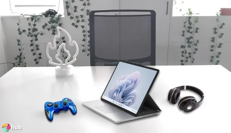 Microsoft Surface Laptop Studio 2 on a white office desk with simple styling for a review