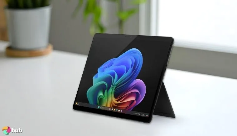 Microsoft Surface Pro 2-in-1 Laptop on a white office desk with simple styling for a review