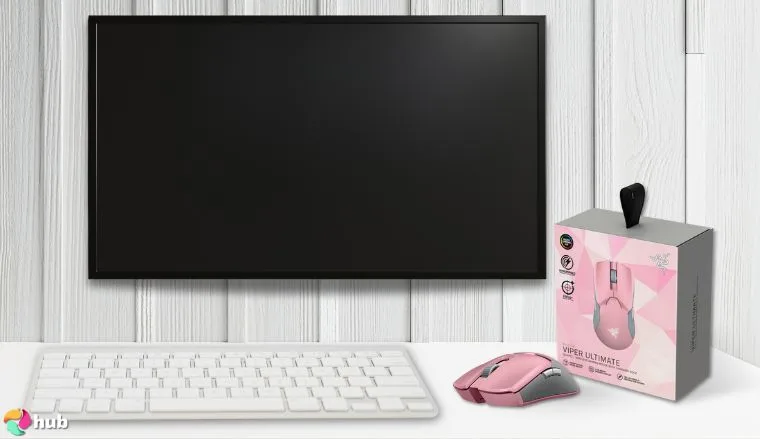 Razer Viper Ultralight Ambidextrous Mouse on a white office desk with simple styling for a review
