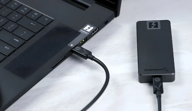 SABRENT Thunderbolt 5 Drive on a white office desk in close-up for a review