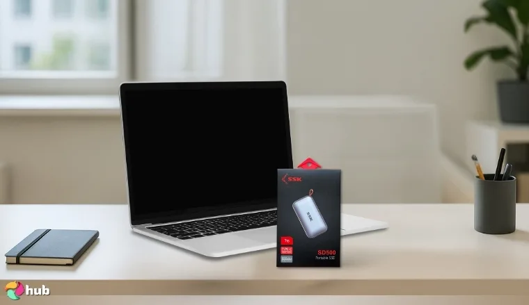 SSK portable SSD package on a white office desk styled for a review