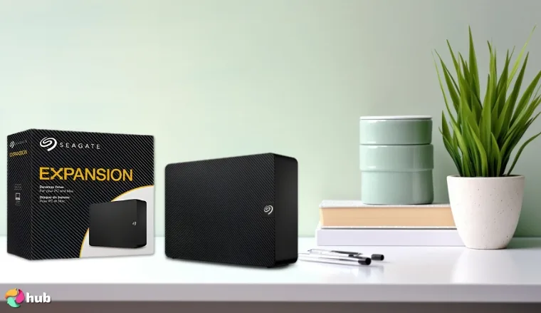 Seagate Expansion HDD on a white office desk with minimal decor for a review