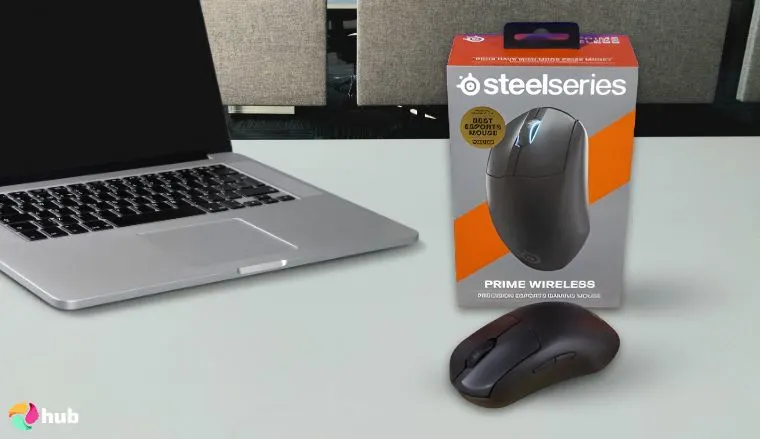 SteelSeries Aerox 3 Mouse on a white office desk styled neatly for a review