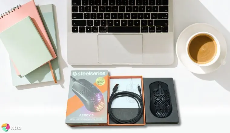 SteelSeries Aerox 3 Mouse Wired on a white office desk in a clean setup for a review