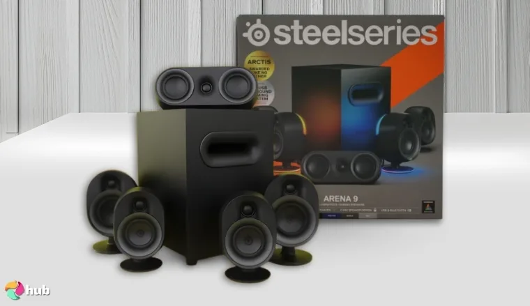 SteelSeries Arena 9 Speakers on a white office desk styled for promotional review