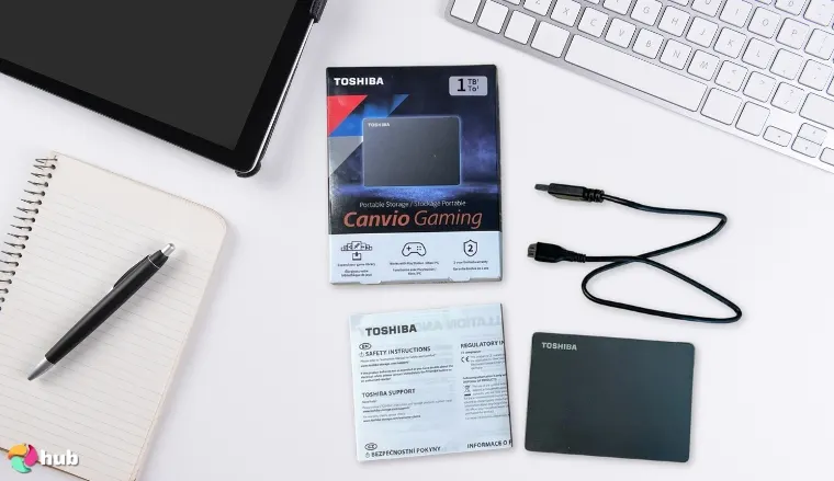 Toshiba Canvio Gaming HDD on a white office desk prepared for testing shots