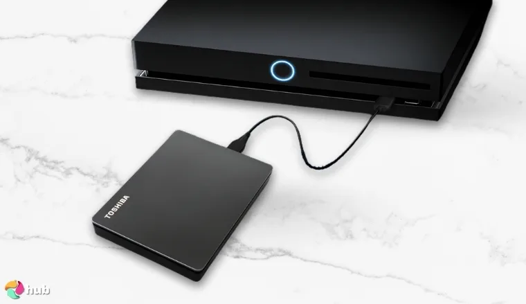 Toshiba external hard drive on a white office desk in close-up for a review