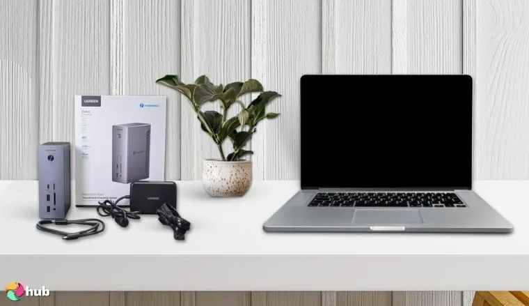 UGREEN Thunderbolt 4 Dock Revodok Max 213 13-in-1 Docking Station on a white office desk in a bright workspace for a review