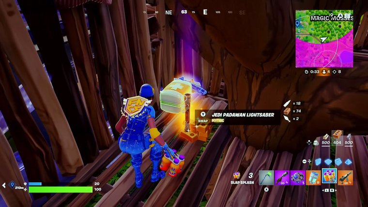 Fortnite - collecting loot from an enemy