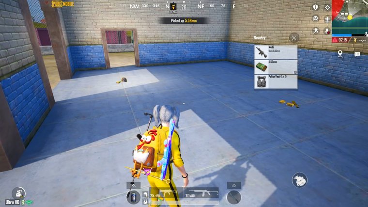 PUBG Mobile - collecting loot from an eliminated enemy