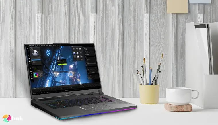 ASUS ROG Strix G16 Laptop on a white office desk in a well-lit setting for a review