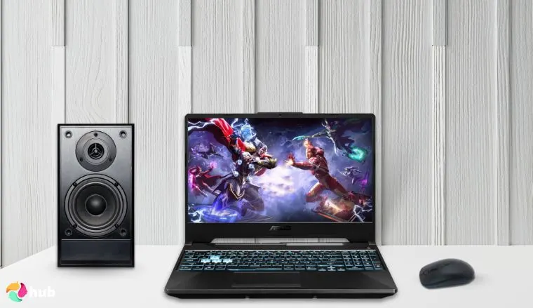 ASUS TUF Gaming A15 Laptop on a white office desk with soft lighting for a review