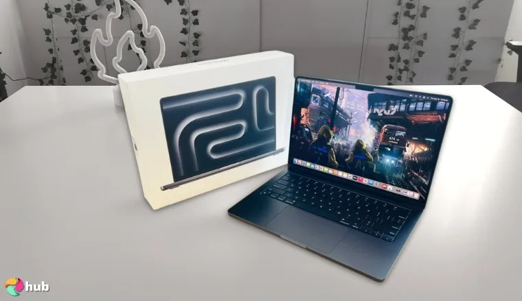 Apple MacBook Pro Laptop 2024 (M4 Max) on a white office desk set up for testing and review