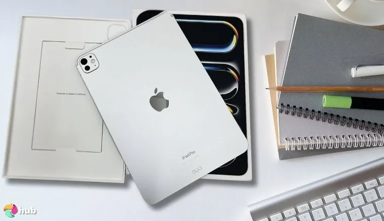 Apple iPad Pro 11-Inch (M4) on a white office desk in a well-lit setting for a review