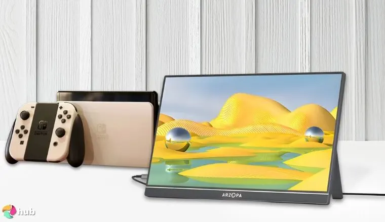 Arzopa Z1FC Portable Gaming Monitor on a white office desk with professional arrangement for a review