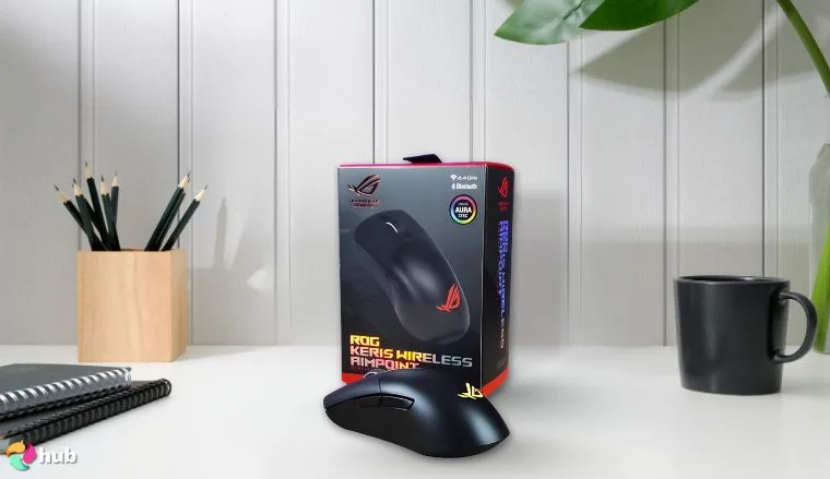 Asus ROG Keris Wireless AimPoint Gaming Mouse Mouse on a white office desk with decorative items for a review