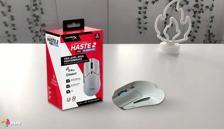 HyperX Pulsefire Haste 2 Pro 4K Mouse on a white office desk with simple styling for a review
