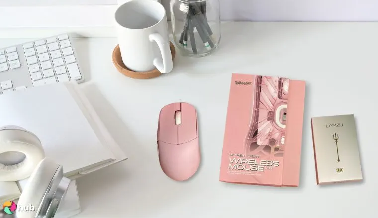 Lamzu Atlantis Mini Champion Edition Mouse on a white office desk in a well-lit setting for a review
