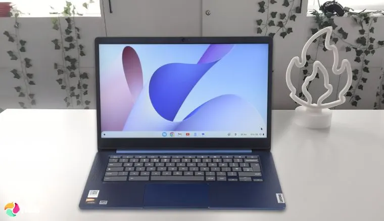 Lenovo IdeaPad Slim 3 Chromebook on a white office desk photographed for a review