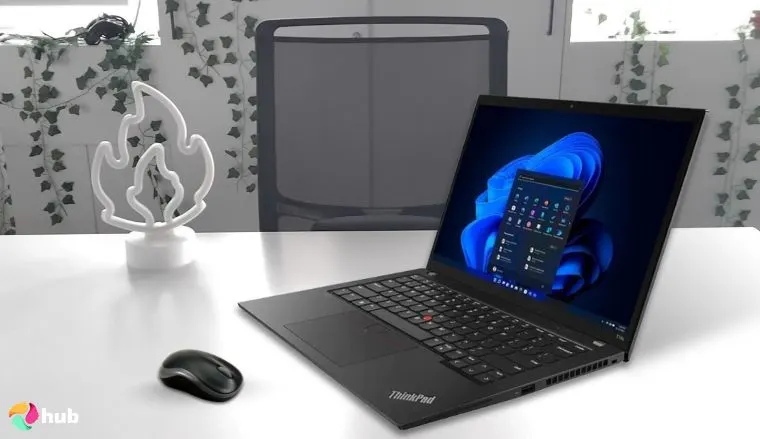 Lenovo ThinkPad T14s Gen 6 Laptop on a white office desk in a top-down view for a review