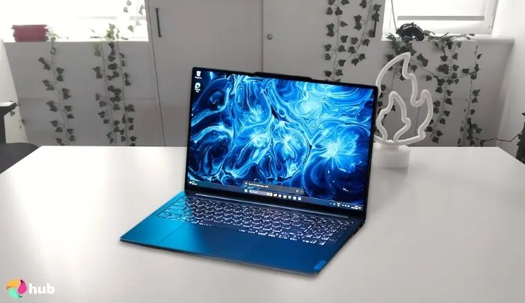 Lenovo Yoga Pro 9i Lenovo Laptop on a white office desk in a minimalist setup for a review