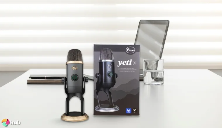 Logitech for Creators Blue Yeti X Microphone on a white office desk in a clean setup for a review