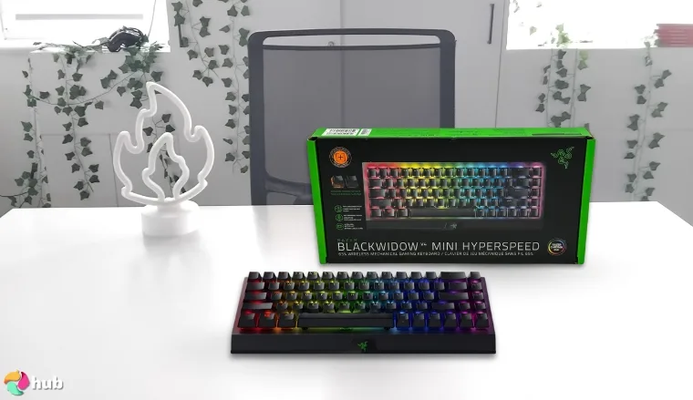 Razer BlackWidow V4 Mini HyperSpeed Gaming Keyboard on a white office desk in a clean setup for a review