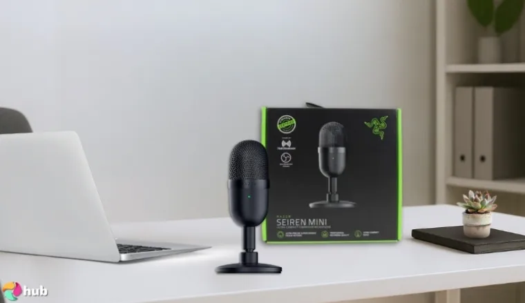 Razer Seiren Mini Microphone on a white office desk with soft lighting for a review