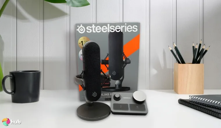 SteelSeries Alias Pro Mic on a white office desk with natural shadows for a review
