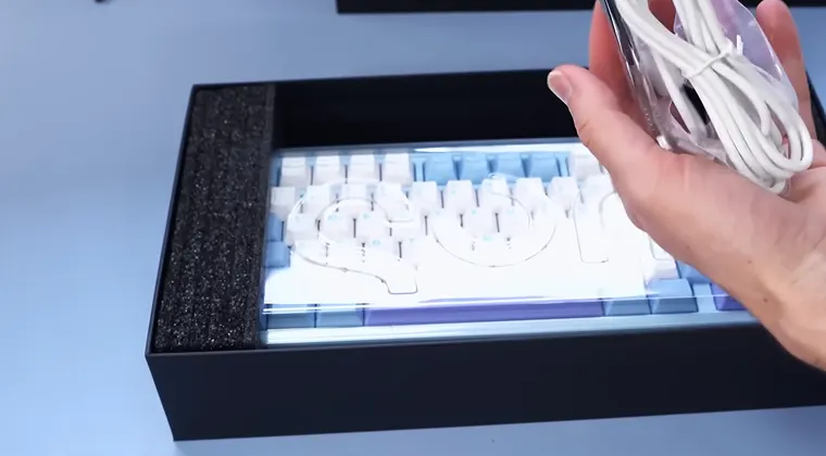 A keyboard with its cable visible
