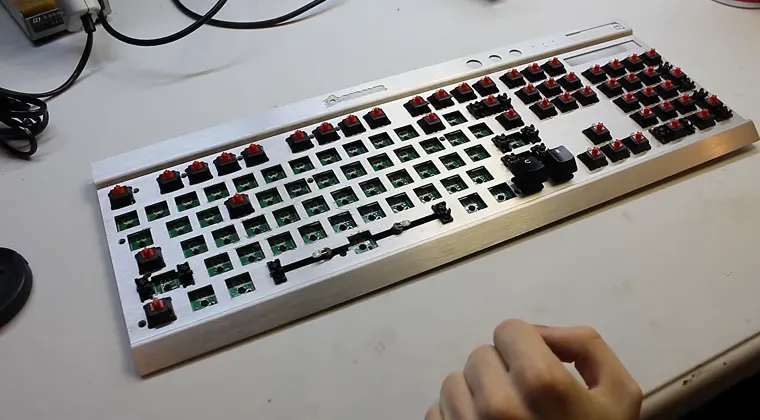Disassembled mechanical keyboard laid out on a table
