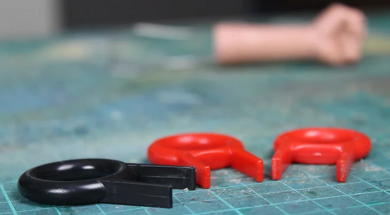 Three keycap pullers placed side by side