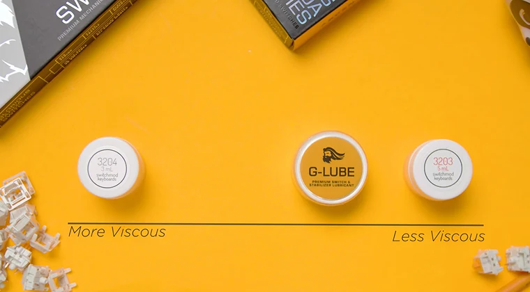 Several switch-lubrication products on a table