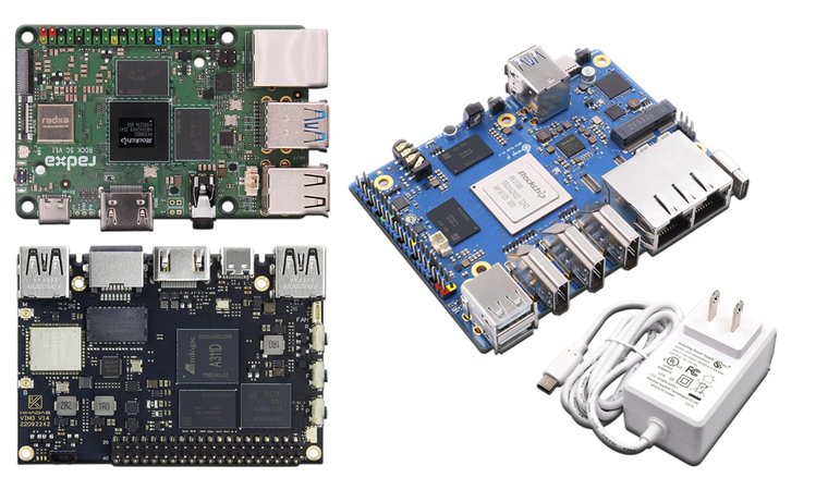 Single board computers Radxa Rock 5C RK3588S2, Orange Pi 5 Plus and Khadas VIM3 with a charger on a white background.