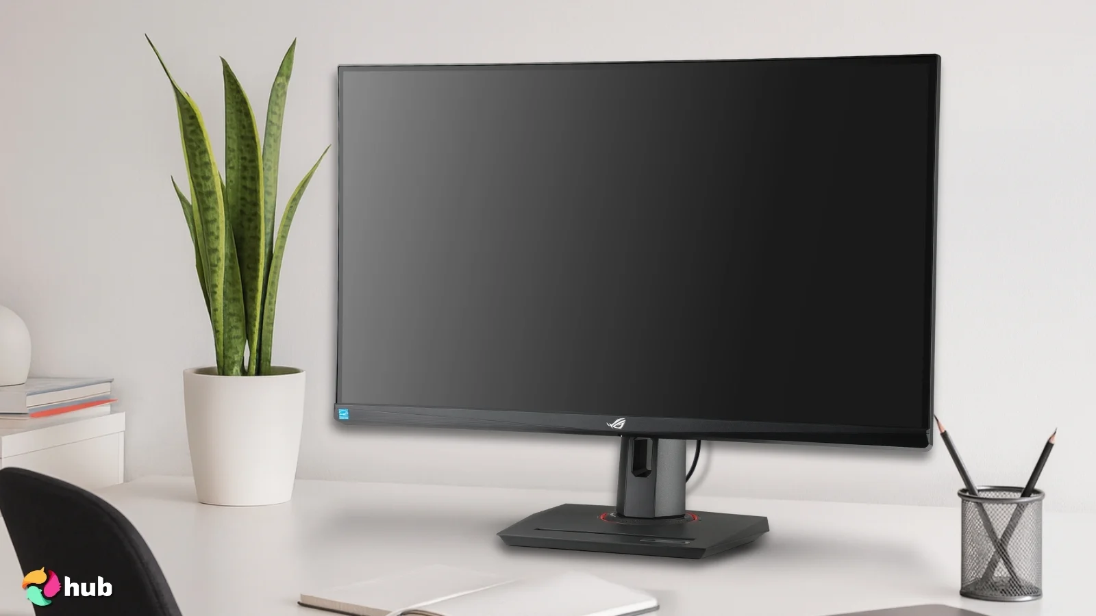 ASUS ROG Strix Gaming Monitor on a white office desk prepared for product photography