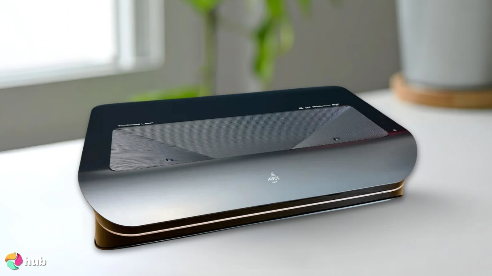 AWOL Vision LTV-3000 Pro Projector on a white office desk prepared for testing shots