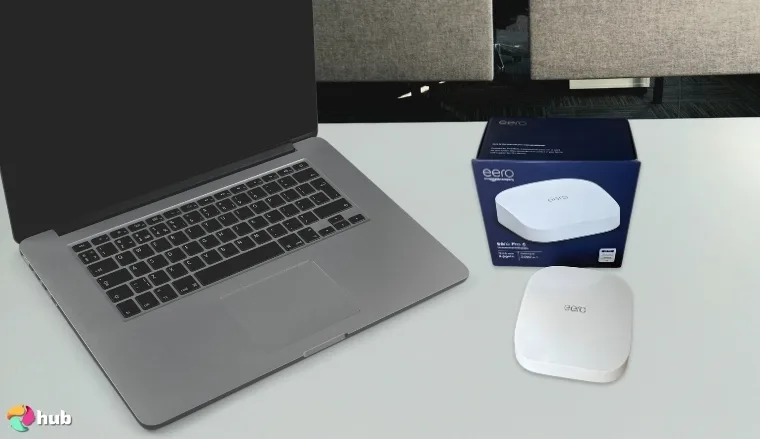 Amazon Eero Pro 6E Mesh Wi-Fi System on a white office desk with professional arrangement for a review