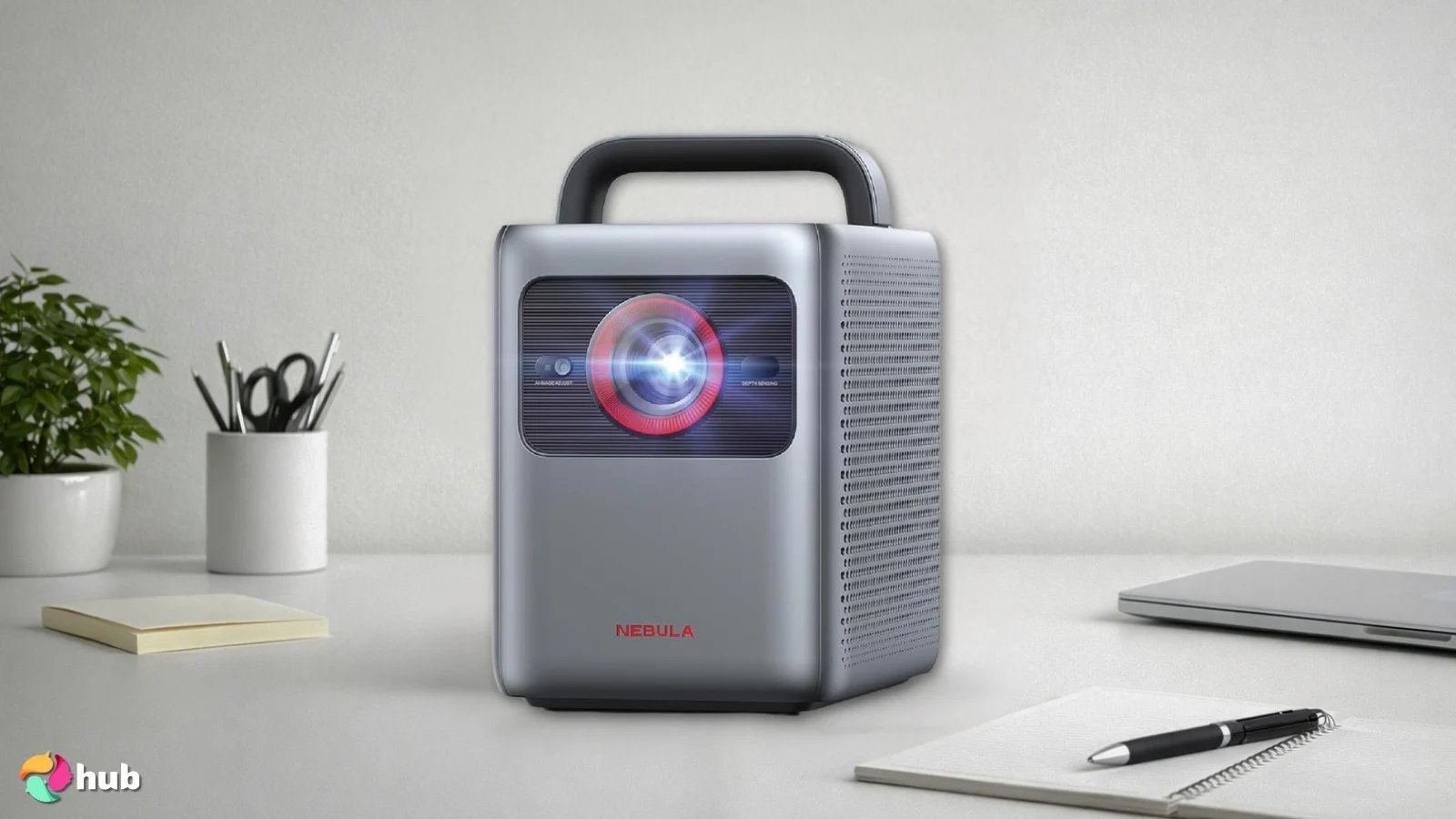 Anker Nebula Cosmos Laser 4K SE 4K Projector on a white office desk with natural shadows for a review