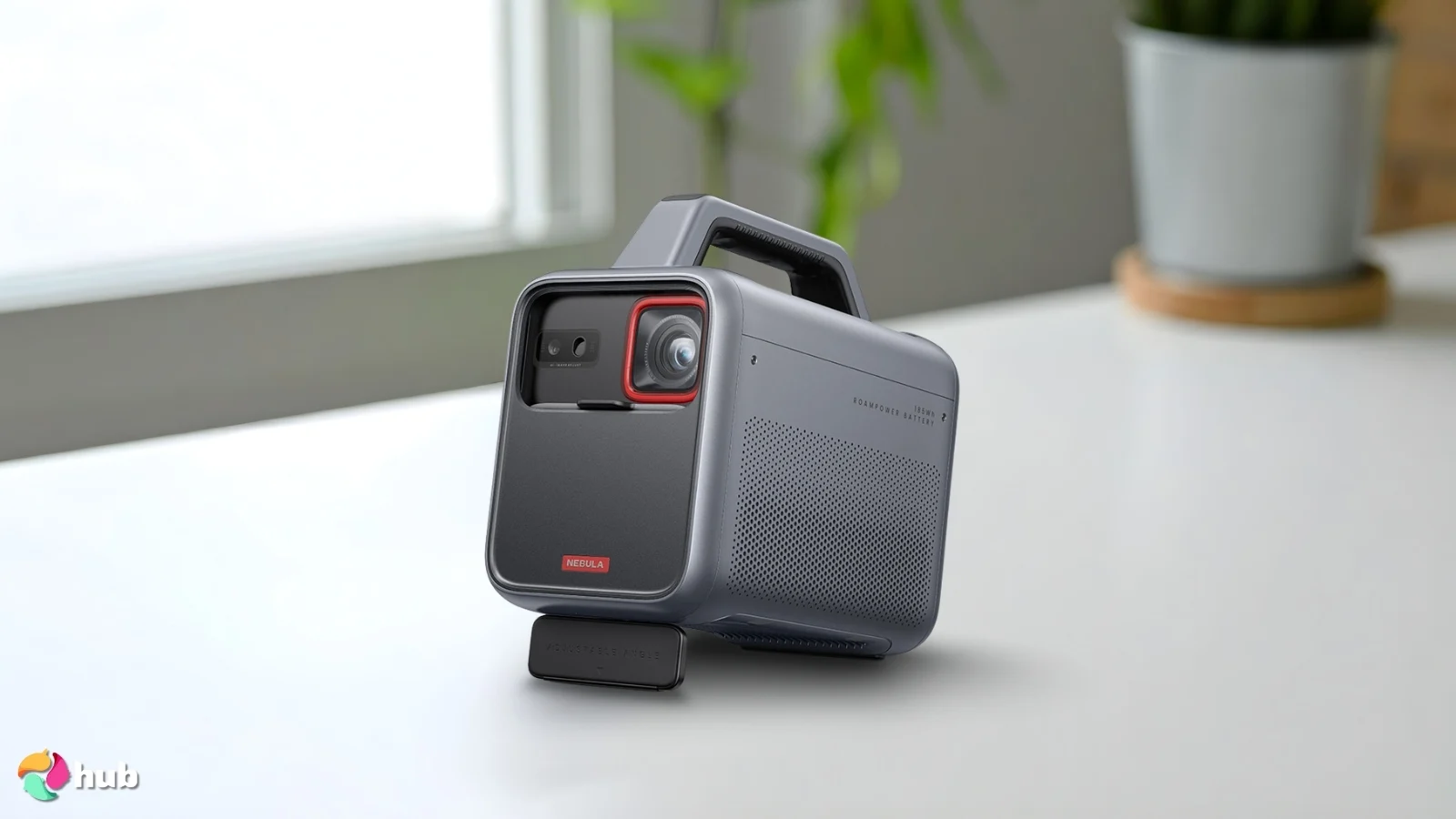 Anker Nebula Mars 3 Portable Projector on a white office desk with soft lighting for a review