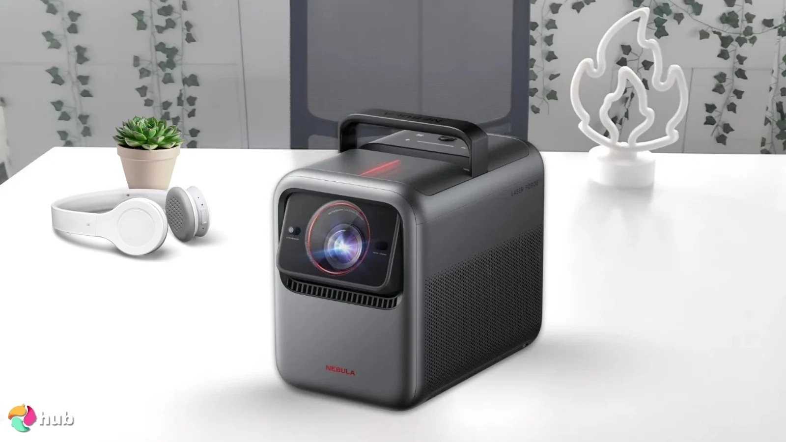 Anker Nebula X1 Projector on a white office desk with decorative items for a review