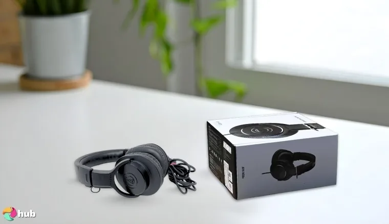 Audio-Technica ATH-M20x Studio Headphones on a white office desk positioned for photography