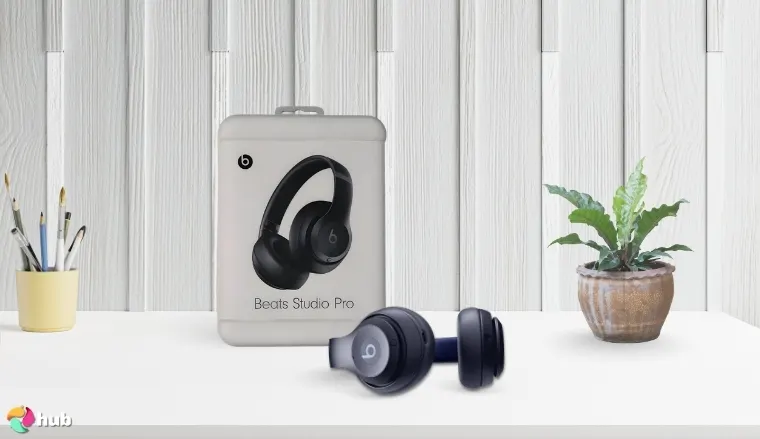 Beats Studio Pro Headphones on a white office desk styled for a review