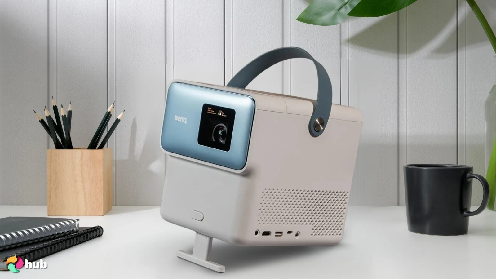 BenQ GP100A Projector on a white office desk styled neatly for a review