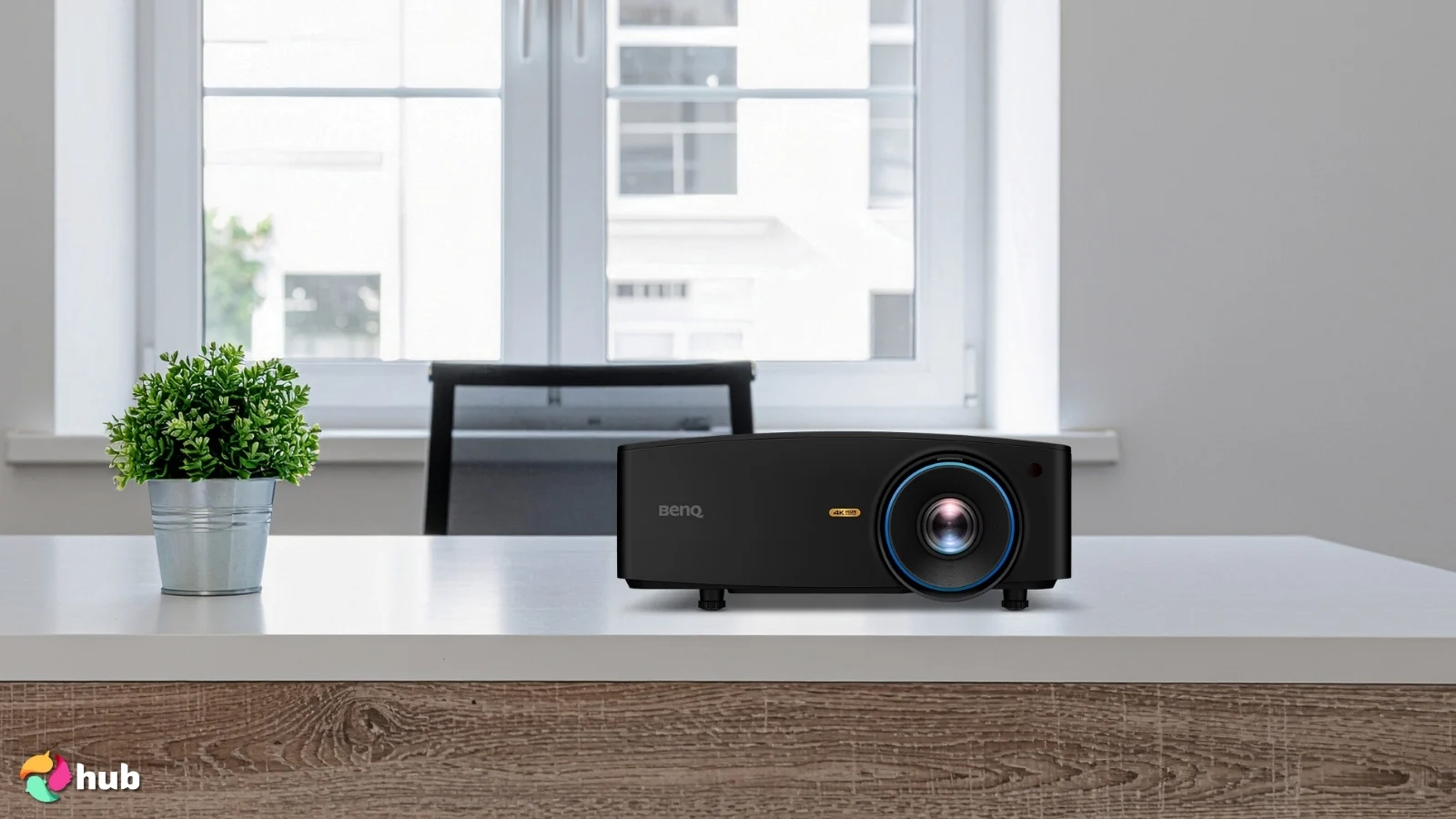 BenQ LK954ST 4K Projector on a white office desk set for a professional product review