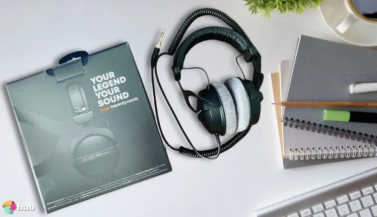 Beyerdynamic DT 880 Pro Audiophile Headphones on a white office desk positioned for photography