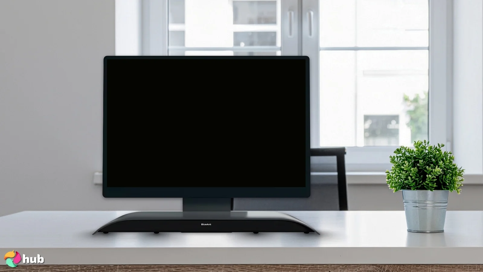 BlueAnt Soundblade Soundbar on a white office desk with soft lighting for a review