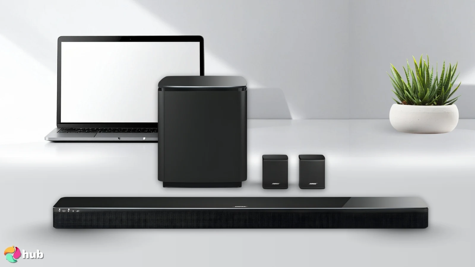 Bose Home Theater System Smart Ultra on a white office desk arranged for a review